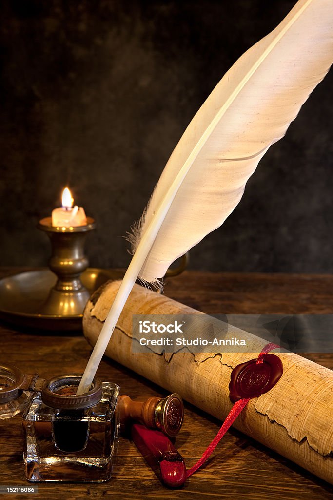 Wax seal and quill pen Ancient parchment or diploma scroll with wax seal and quill pen Paper Scroll Stock Photo