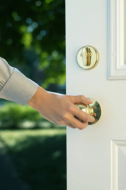 istock Woman hand opening a door #1 152116219
