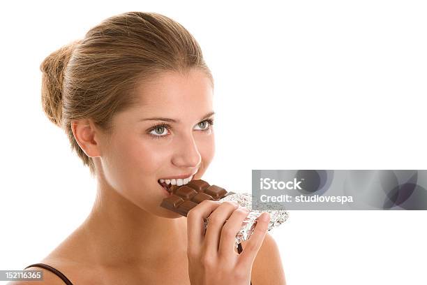 Woman Eating Chocolate Stock Photo - Download Image Now - 16-17 Years, 18-19 Years, 20-24 Years