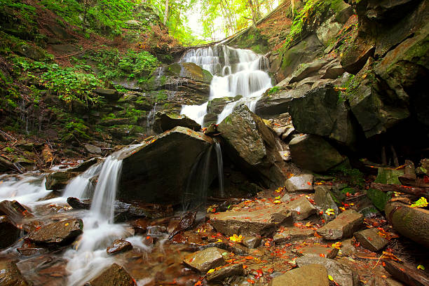 istock Autumn mountain waterfall in forest. Beauty wild nature landscape 152116839