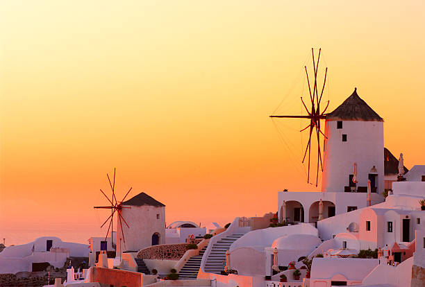 Amazing sunset at Oia village in Santorini island.
