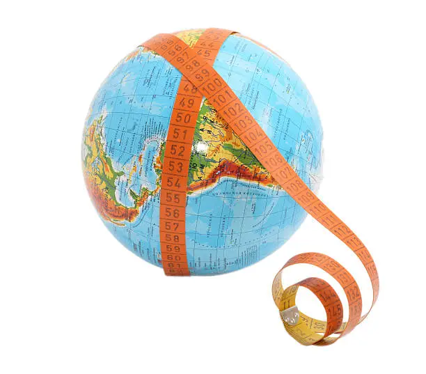 Photo of globe with meashure tape on it