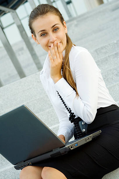 istock Business woman with laptop 152118088