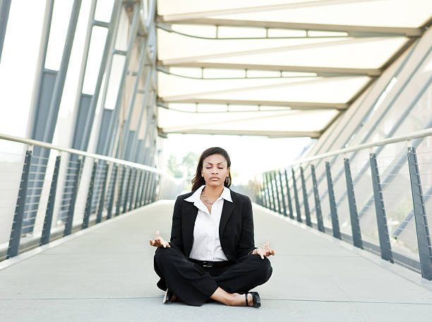 istock Black businesswoman meditating 152119238