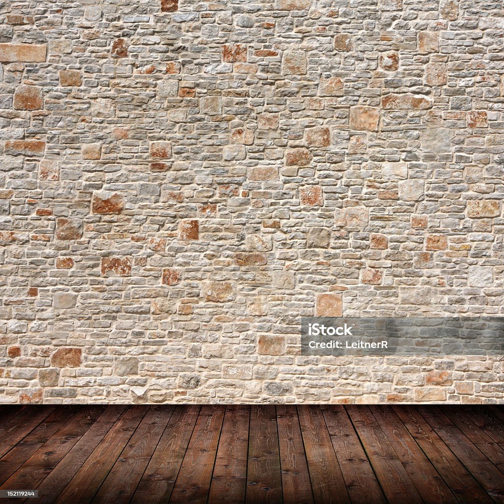 Photo of a patterned wall of an interior room Interior room with stone wall Stone Wall Stock Photo