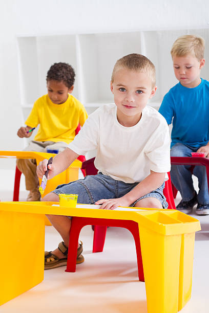 istock preschool kids painting 152119338