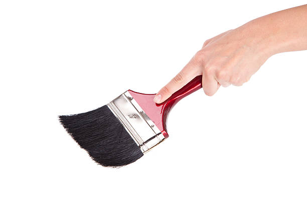 istock Hand with paintbrush isolated on white background 152119688