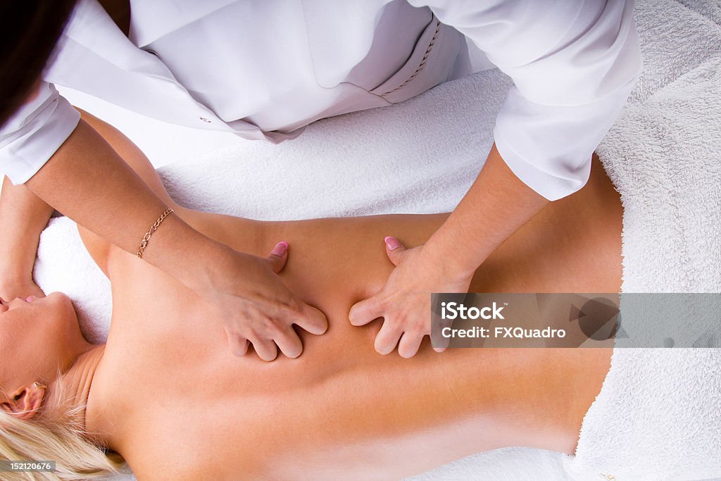 Manual therapy for blond woman Masseur relax beautiful young patient Adult Stock Photo