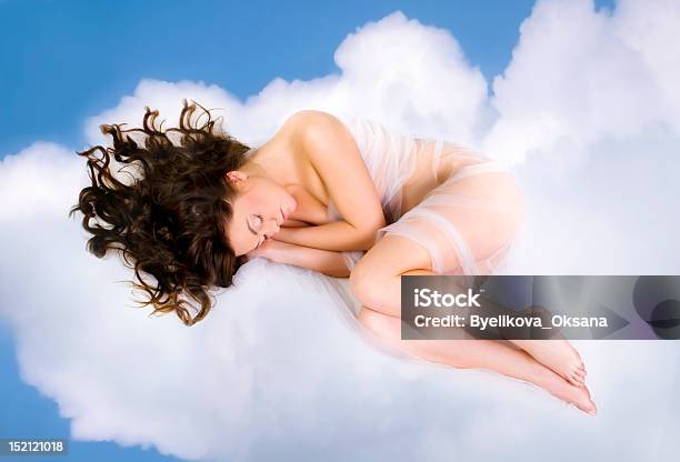 Woman Lying On Clouds Stock Photo - Download Image Now - Cloud - Sky, One Woman Only, Sleeping