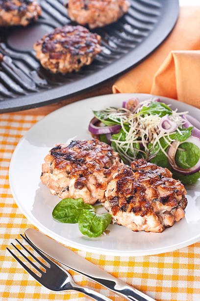 istock Salmon cutlet with a salad of spinach and onion 152121390