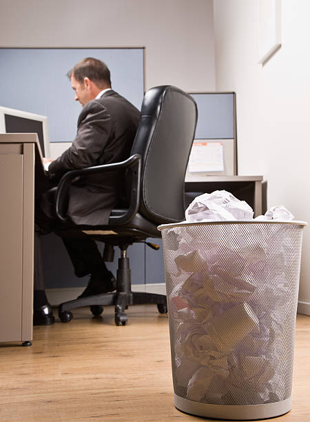 istock Businessman at Desk with Trash Basket 152121547