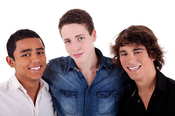 istock friends: three young man of different colors,looking and smiling 152123222