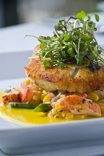 istock John Dory over lobster and vegetables 152124307