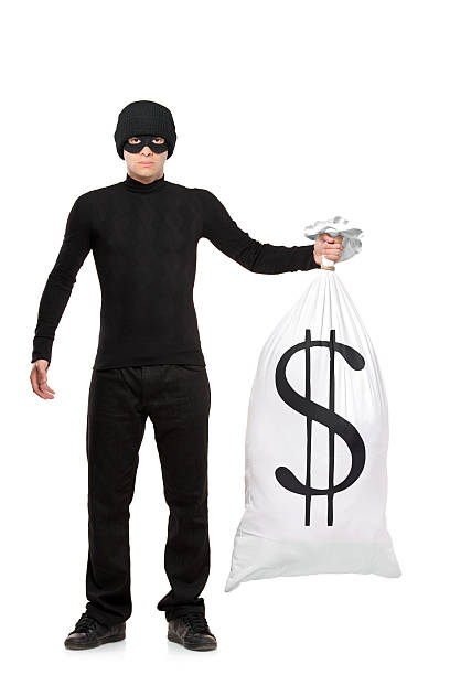 istock Full length portrait of thief holding a bag 152124419