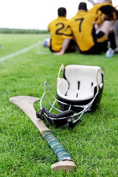 Helmet lying after hurling match stock photo