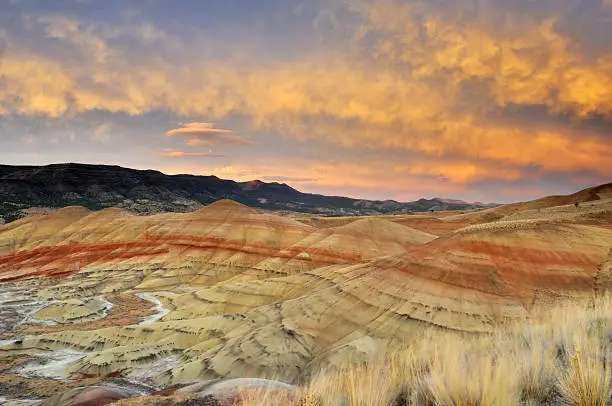 colorful painted hills with spectacular sunset clouds