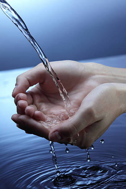istock woman hands in water 152125332
