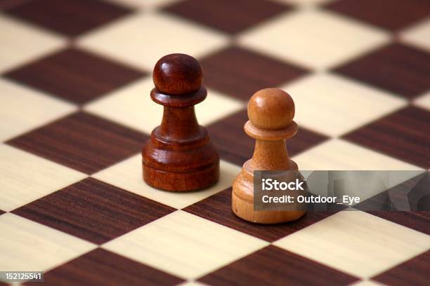 Confrontation On A Checkerboard Stock Photo - Download Image Now - Aggression, Agility, Authority