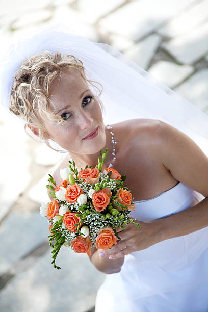 istock young beautiful  bride with wedding bouquet 152126225