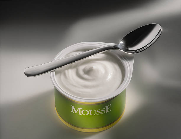 mousse de luz y la cuchara - foto de stock