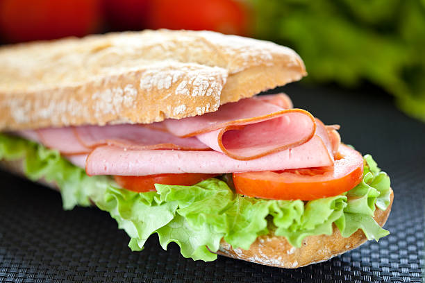 istock sandwich of ham lettuce and tomato 152128251