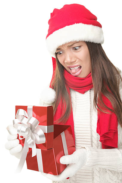 istock Christmas gift woman unhappy opening present 152129769
