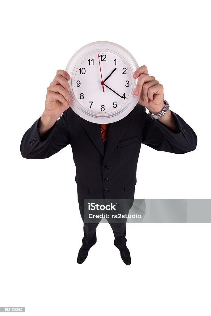 Man holds a clock Adolescence Stock Photo