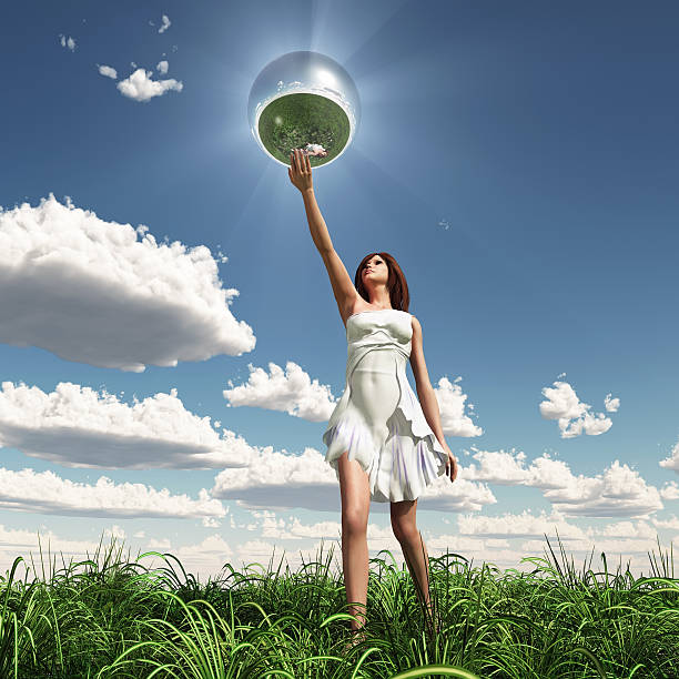 istock woman holding mirror sphere 152130400