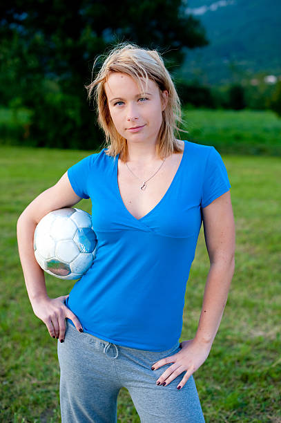 istock Cute girl with soccer ball 152130448