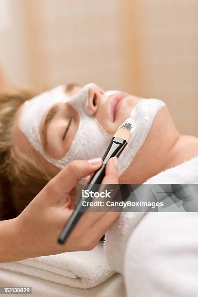 Male Cosmetics Man Having Facial Mask Stock Photo - Download Image Now - Adult, Applying, Beautiful People