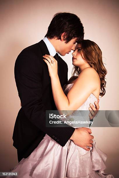 Attractive Young Couple Embracing For A Kiss Stock Photo - Download Image Now - 20-29 Years, Adult, Adults Only