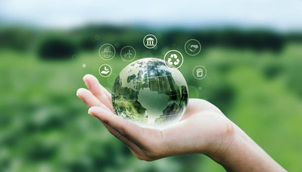 istock Hand of human holding earth with ESG icon. 1521320167