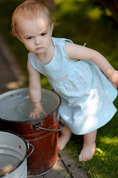 istock Little baby walking in a yard 152132038