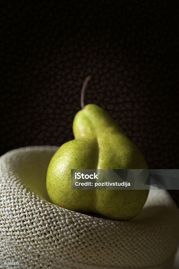 Pear Pear on the hat Pear Stock Photo