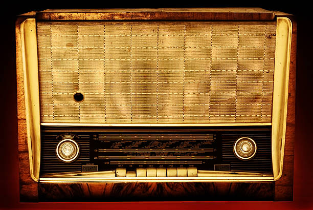 istock Old radio isolated on a dark background 152132238