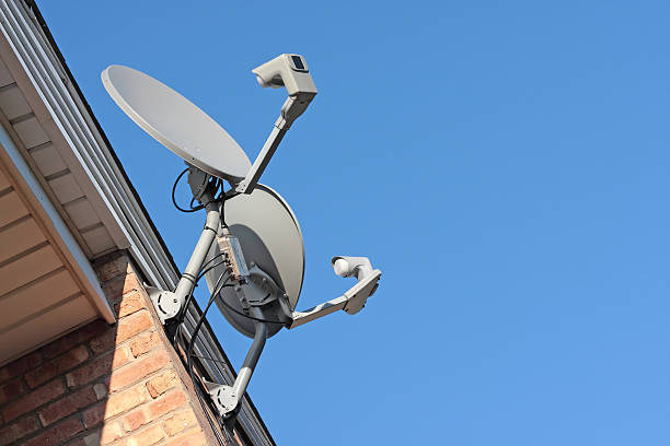 istock Residential satellite dishes pointing to the sky 152133453
