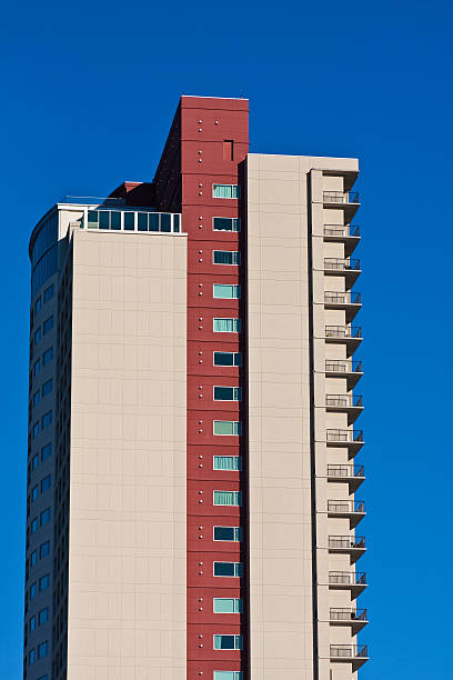 istock Side of Red and Beige Condos on Blue 152133482