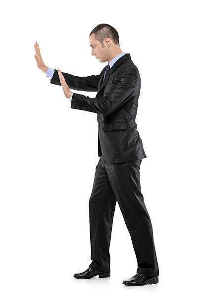 istock Full length portrait of a man pushing something imaginary 152133686