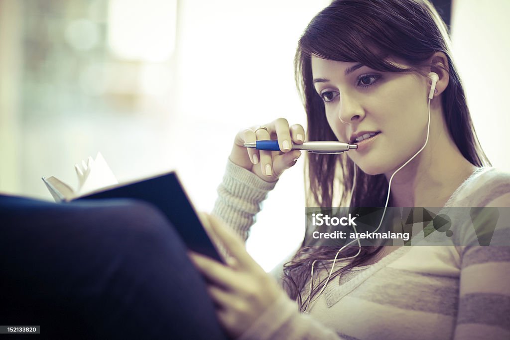 Mixed race ollege student A portrait of a mixed race college student at campus Adult Stock Photo