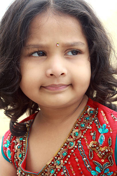 istock Cute Indian Girl Looking Somewhere 152134285