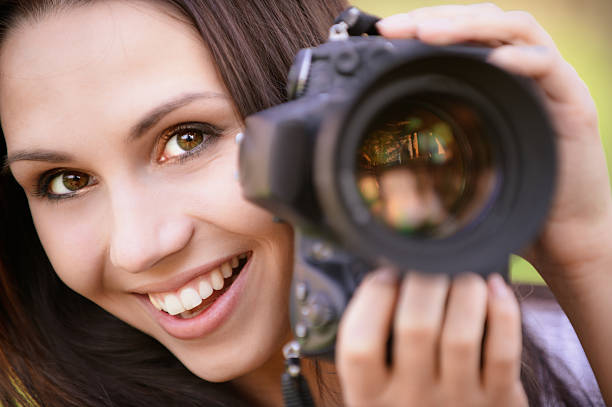 istock Beautiful girl with camera 152135426
