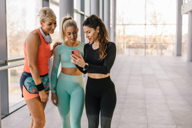 istock female friends workout in gym 1521357481