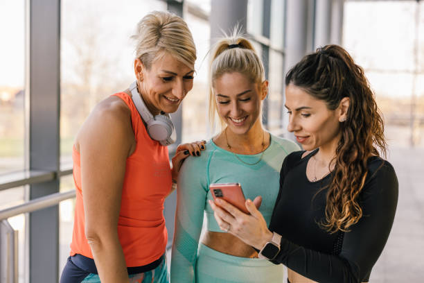 istock female friends workout in gym 1521357483