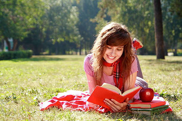 woman with book stock photo