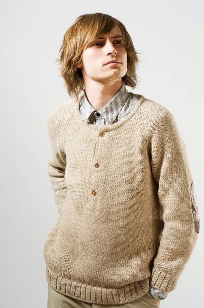 Portrait of young man on light grey background stock photo