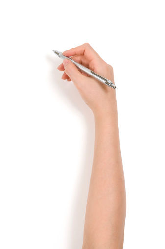 Female hand holding pen isolated on white background