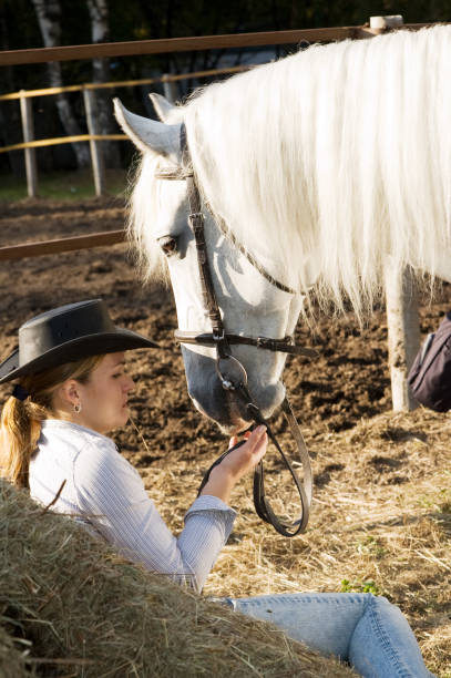 istock Young woman with her horse 152139780
