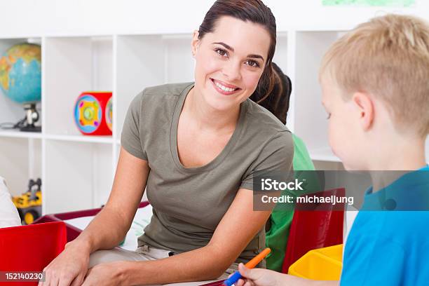 Beautiful Kindergarten Teacher Stock Photo - Download Image Now - Adult, Beautiful People, Beautiful Woman