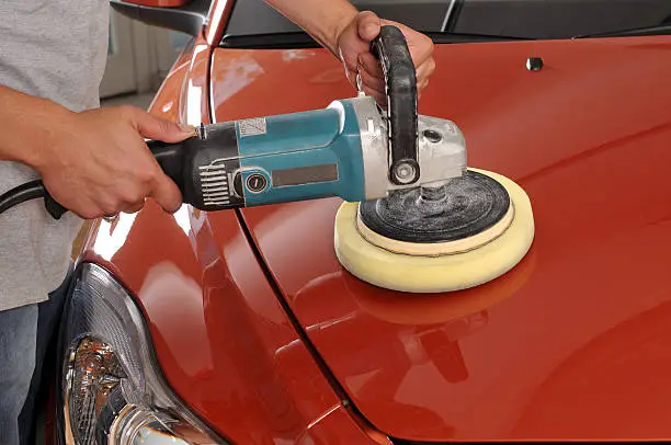 Car care with power buffer machine at service station - a series of CAR CARE images.   