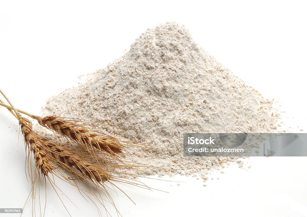 Whole flour and wheat ears Whole flour and wheat ears on white background Flour Stock Photo